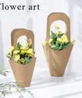 30 Pack Kraft Paper Flower Gift Bags With Handles For Bouquets And Gifts No Fuss Easy Carry Party Favor Bags For Thanksgiving Birthday Wedding And Other Celebrations, showcasing two bags with yellow flowers.