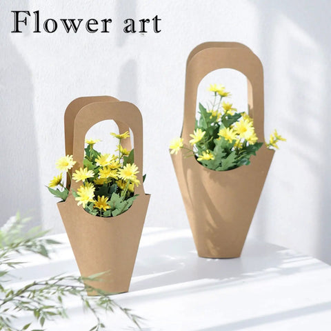 30 Pack Kraft Paper Flower Gift Bags With Handles For Bouquets And Gifts No Fuss Easy Carry Party Favor Bags For Thanksgiving Birthday Wedding And Other Celebrations, showcasing two bags with yellow flowers.