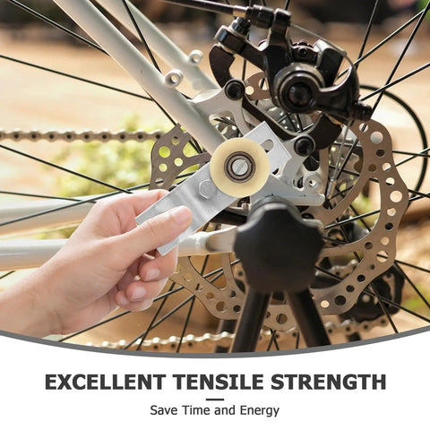 Heavy Duty Motorcycle Chain Tensioner Tool With Pulley Roller For Motorized Bike Engine Kits, Pocket Dirt Bikes, Minibikes And Atvs Ensure Smooth Ride With Bearings, silver metal close-up on bike wheel