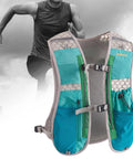 Blue hydration vest and pack with adjustable chest strap, designed for night runs, featuring reflective stripes for safety.
