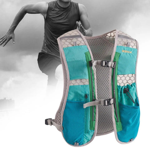 Blue hydration vest and pack with adjustable chest strap, designed for night runs, featuring reflective stripes for safety.