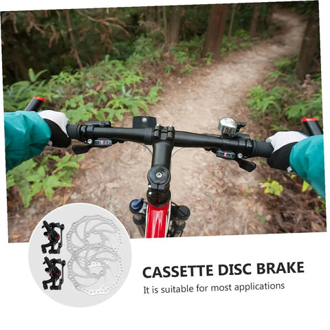 Top Shelf Aluminum Mechanical Disc Brake Kit For Mountain Bikes With 160MM Front Rear Rotors dual adjust knobs and tri align calipers on mountain bike handlebars.