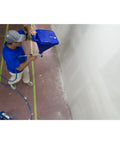 Man using Sharpshooter 1 Hopper Gun for Texture and Spray, 2 Gallon Nylon Gun with Seven Orifice Sizes, 45 Degree Angle Adapter