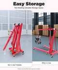 No Sweat Heavy Duty Folding Hydraulic Engine Hoist And Cherry Picker Shop Crane with adjustable leveler in use lifting an engine.
