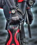 Diver wearing scuba suit with wrist-mounted dive computer, Get Your Hands On This Awesome Scuba And Freediving Dive Computer That Comes Packed.