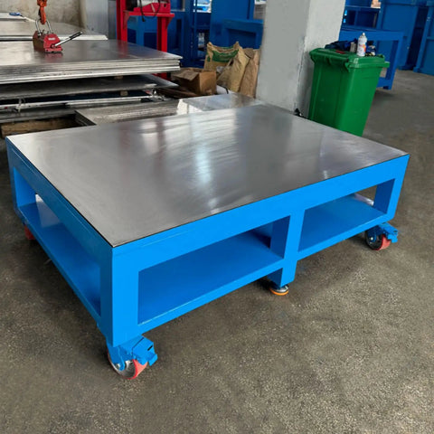 Rock Solid No Nonsense Heavy Duty Workbench For Welding And Metal Fabrication With 8mm Thickened Steel Plate on blue frame with wheels.