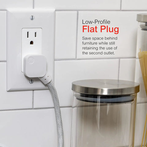 Three Outlet Power Strip With Braided Six Inch Extension Cord Grounded Flat Plug ETL Listed White plugged into wall outlet