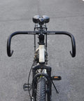 Front view of drop bar bent handlebar aluminum alloy 6061 T6 on road bike showcasing 25.4mm and 31.8mm clamp compatibility.