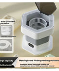Game Changer No Sweat Portable Folding Washing Machine 8L Compact Mini Washer Dryer with lid open and draining basket.