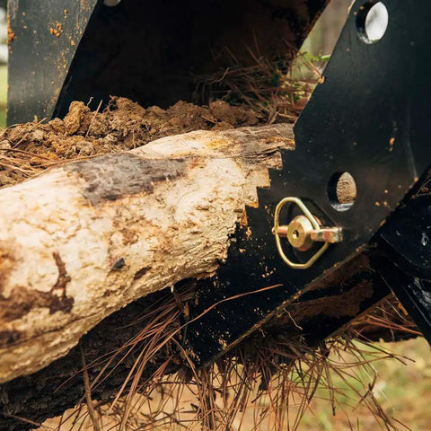 Close-up of skid steer fronthoe attachment with 14 inch bucket and bolt on backhoe thumb for universal quick attach on Bobcat loader
