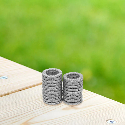 Twenty Piece M10 Wedge Stack Lock Washers Tough Heavy Manganese Steel Hardware Fasteners stack on wooden surface.