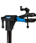 Close-up of Lightweight Bike Repair Stand For On The Go Pro Grade Adjustable Clamp From 38 To 58 Inches, showing clamp mechanism.