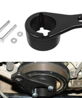 Crankshaft Damper Pulley Holding Tool with 2 crank bolts for Toyota and Lexus, shown in use on harmonic pulley.