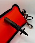 Close-up of scuba diving lift for spearfishing and lobstering with inflation valve, nylon material, and stainless steel stringer attachment.