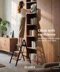 Three Step Ladder With Anti Slip Pedals, Folding Step Stool In Black And Woodgrain, Lightweight Aluminum Frame, Non Slip Feet For Stable Climb, Easy Open Fold, Built To Last For Home, Garage, And DIY Projects used for reaching high bookshelf