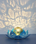 Solar Lotus Flower Garden Lights For Outdoor Patio Decor, crackle ball reflecting warm amber glow, blue metal petals