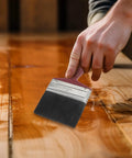 Hand applying stain with All Purpose Paint Brush Set For Walls Ceilings Furniture Decks And Wood Fences Large Flat And Angled Brushes Stain