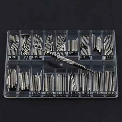 Top-down view of stainless steel watch band pins (8–25mm) organized in a clear organizer with a pin remover tool.