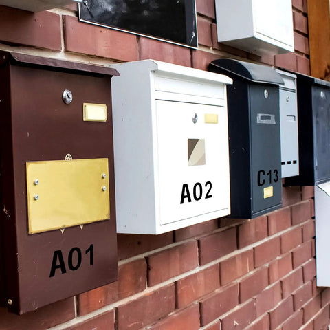 Mailboxes with black vinyl numbers from Self Adhesive Vinyl Letters And Numbers Kit 8 Sheets Black 1 Inch Characters 536 Pieces