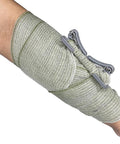 Rhino Rescue 6-inch Israeli-style emergency bandage wrapped forearm; olive-green compression wrap with gray fasteners.