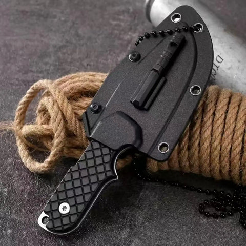 Close-up of Mini Survival Knife With Sheath, Back Clip Whistle, And Multi Tool Build on rope, EDC Ready for outdoor prep