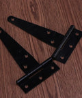 Two black 4 inch T hinges for doors and gates from 10 Pack Heavy Duty 4 Inch T Hinges For Doors And Gates Thickened Iron Gate Hinge Set
