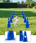 Dog Agility Hurdle Cone Set for Training, bright blue cones with orange poles in grass, small dog practicing jumps