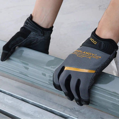Hands wearing Mens Work Gloves Touch Screen Utility Mechanic Gloves With Padded Knuckles And Palm, gripping a metal beam.