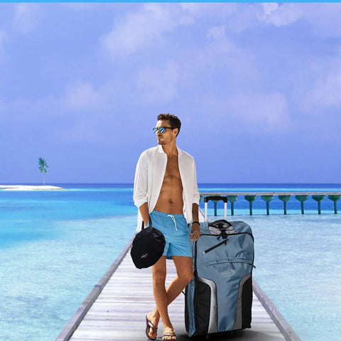 Man with Big Mesh Beach Bag With Zipper Pockets Foldable Duffle on pier by ocean, ideal for scuba and snorkel gear, outdoor adventures.