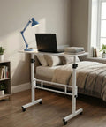 Rolling Ergonomic Standing Desk With Smooth Wheels Adjustable Height Desktop Laptop Workstation Level Up Your Remote Grind Straight Up, in a bedroom setting with a laptop.
