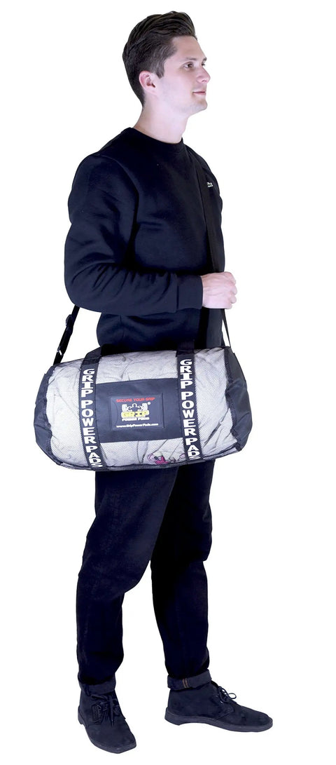 Person holding a Breathable Mesh Gear Bag Built Heavy Duty For Gym Beach Swim Scuba Sports Dive And Outdoor Use.