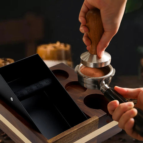 Professional Grade Wooden Espresso Knock Box And Sleek Tamping Station With Beefy Stand Base For Real Hustle Fits Standard 58mm Portafilters Home Barista Setup with a hand tamping coffee.