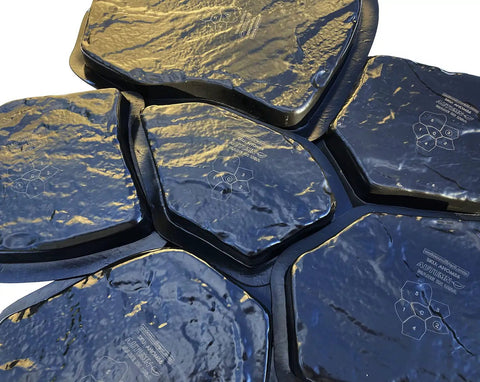 Set Of 6 Durable Flagstone Molds For Concrete Pavers And Garden Walkways Easy To Use Reusable Plastic Cement Molds shown stacked.