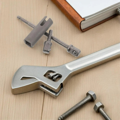 Must-Have Stainless Steel Trailer Jack Drill Adapter with wrench and hex bits on wooden surface for RV leveling and scissor jacks.