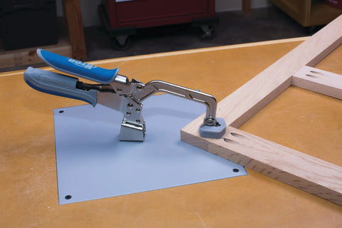 Automaxx Heavy Duty Bench Clamp System With Automatic Thickness Adjustment securing wood on workbench