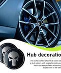 Badass Metal Skull Wheel Center Caps 4 Piece Set waterproof aluminum hub covers with skull design on a black rim.