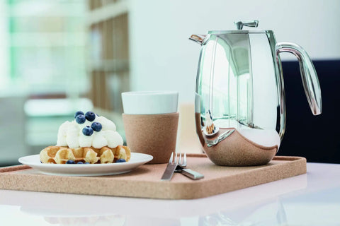 Thermal French Press Coffee Maker 51 Oz Double Wall Stainless Steel Insulated Plunger with waffles and coffee cup on cork tray.