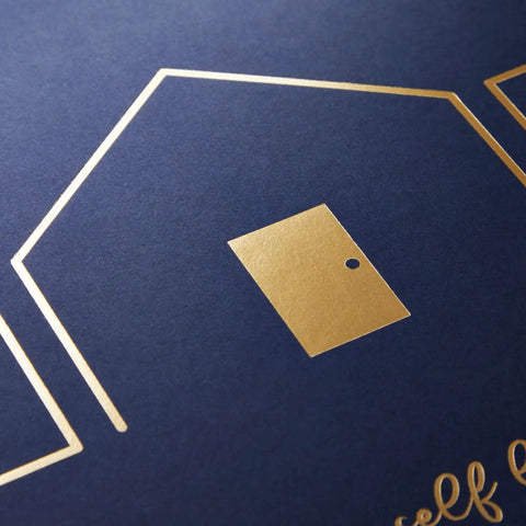 Navy Blue cover with gold house and door outline from Open House Guest Sign In Book And Realtor Tent Cards Set 2 Pack 8.5 By 11