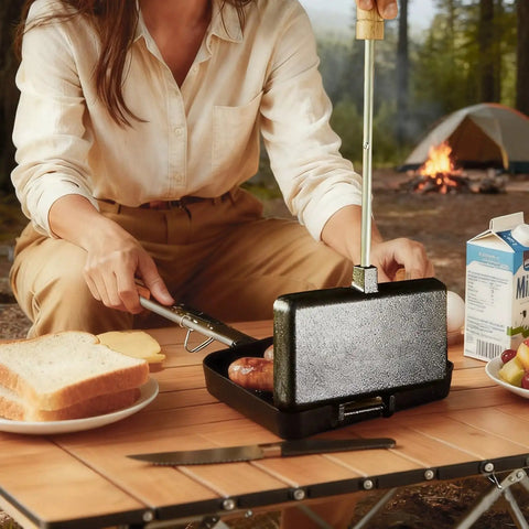 Oukens Non Stick Cast Iron Double Pie Iron Portable Campfire Press With Removable Handles For Grill Stove Mountain Cooking Adventure Gear in use outdoors.