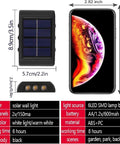 Dimensions and specifications of Up And Down Solar Fence Lights 2 Pack Waterproof Solar Step Lights Warm White Outdoor Deck Lighting next to phone.