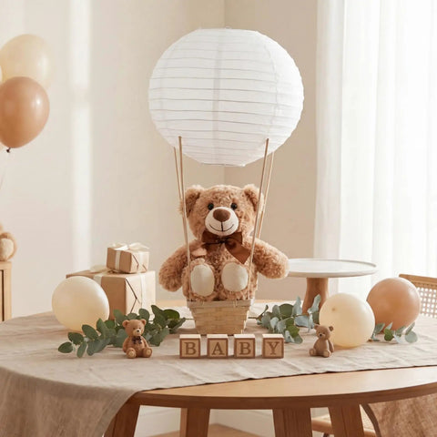 Six Set Large Hot Air Balloon Centerpiece Kit With 13.7 Inch Plush Bears White Paper Lantern Baskets Sticks And Glue Gun For Baby Shower Gender Reveal Wedding And Birthday Party Decor on a wooden table with decorative blocks and balloons.