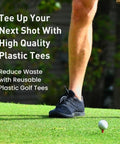Person using Step Down Plastic Golf Tees Unbreakable 50 Pack One And A Quarter Inch 32 mm Red Reusable Castle Tees on grass