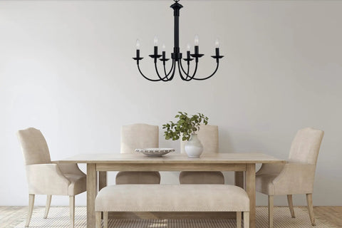 Indoor Candle Chandelier 26.5 Inch in Rubbed Oil Bronze above dining table with chairs, featuring upward candle stem lights.
