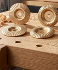 6pc Orange Wood Shaping Disc For Angle Grinder With Sanding And Polishing features on workbench surrounded by wood shavings.