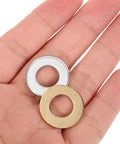 120 Piece Assorted Flat Washer Kit Featuring Nylon Brass and White Zinc Spacers With O Ring Gaskets M10x20 Size Perfect Replacement Washers For Household Screws Decks DIY Projects And Industrial Use, brass and zinc washers in hand
