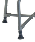 Close-up of non-slip feet on Heavy Duty Bariatric Shower Chair With Back Support, 600 lb weight capacity, adjustable height, grey frame.