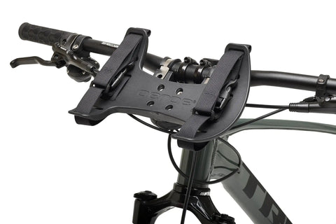 Close-up of Spider Handlebar Cradle With 8L Heavy Duty Dry Bag For MTB Gravel And EMTB Bikes Quick Release Mount attached to bike.