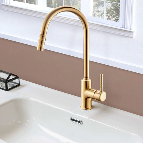 Gold High Arc Kitchen Faucet With Pull Down Sprayer, Single Handle, above white sink, sleek modern design, in kitchen setting.