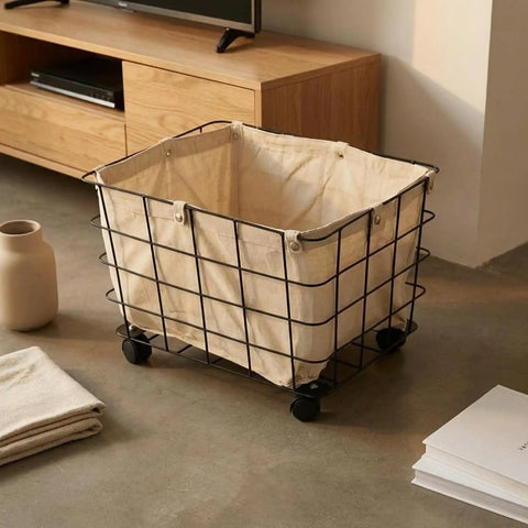 Heavy Duty Rolling Storage Basket For Toys, Smooth Swivel Caster Wheels Organizer With Removable Canvas Liner in black iron frame.