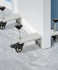 Heavy Hitter Door Dolly Cart 2 Pack 1000 Lb Capacity Steel Frame With 360 Swivel Brakes For Easy Panel Moves on floor.